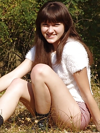 AdiPics presents: Outdoor girl Juliya plays in the field