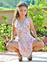 AdiPics presents: Stunning brunette young Isabel shows tiny tits and spreads her legs outdoor