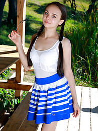 AdiPics presents: Fresh-Faced russian beauty Mia Grandy gets totally naked on a picnic table in a garden